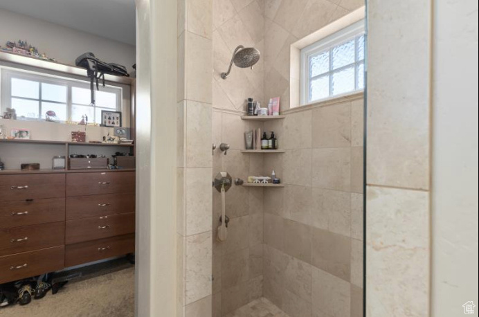 Bathroom with a tile shower