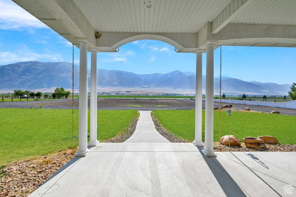 View of patio / terrace with a mountain view