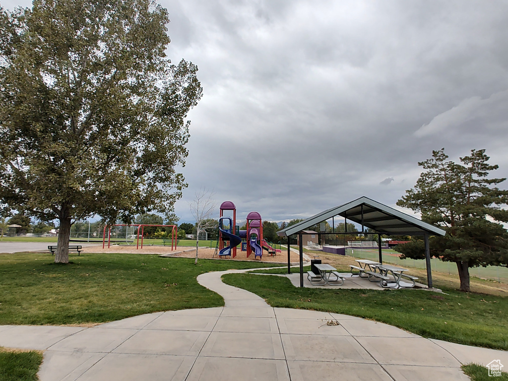 View of play area with a yard