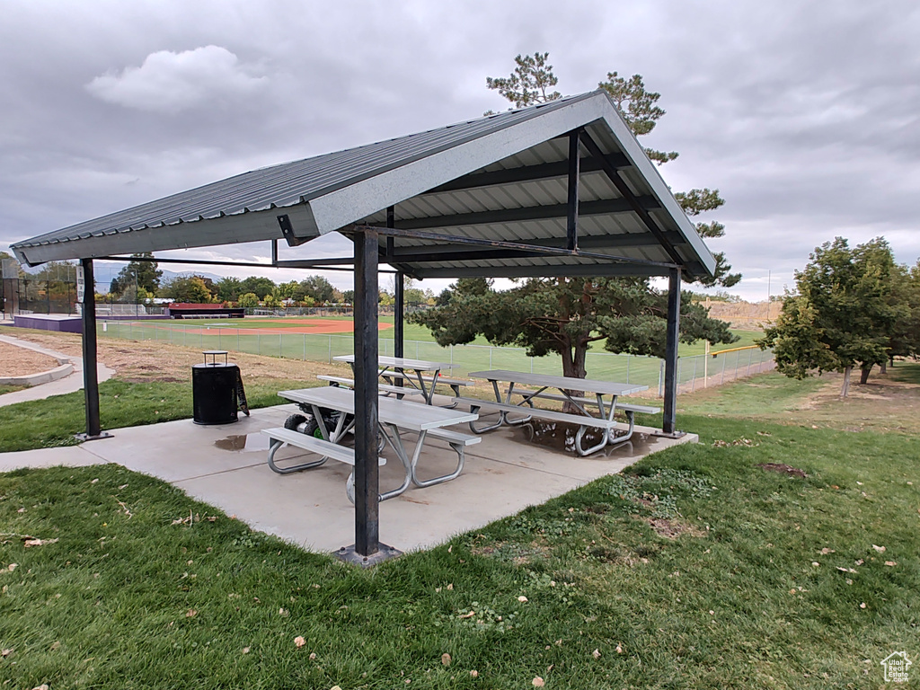 Surrounding community featuring a gazebo, a lawn, and a patio area