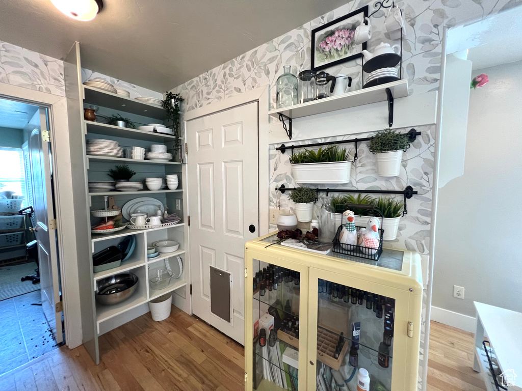 Pantry featuring beverage cooler