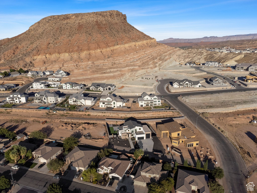 Birds eye view of property with a mountain view