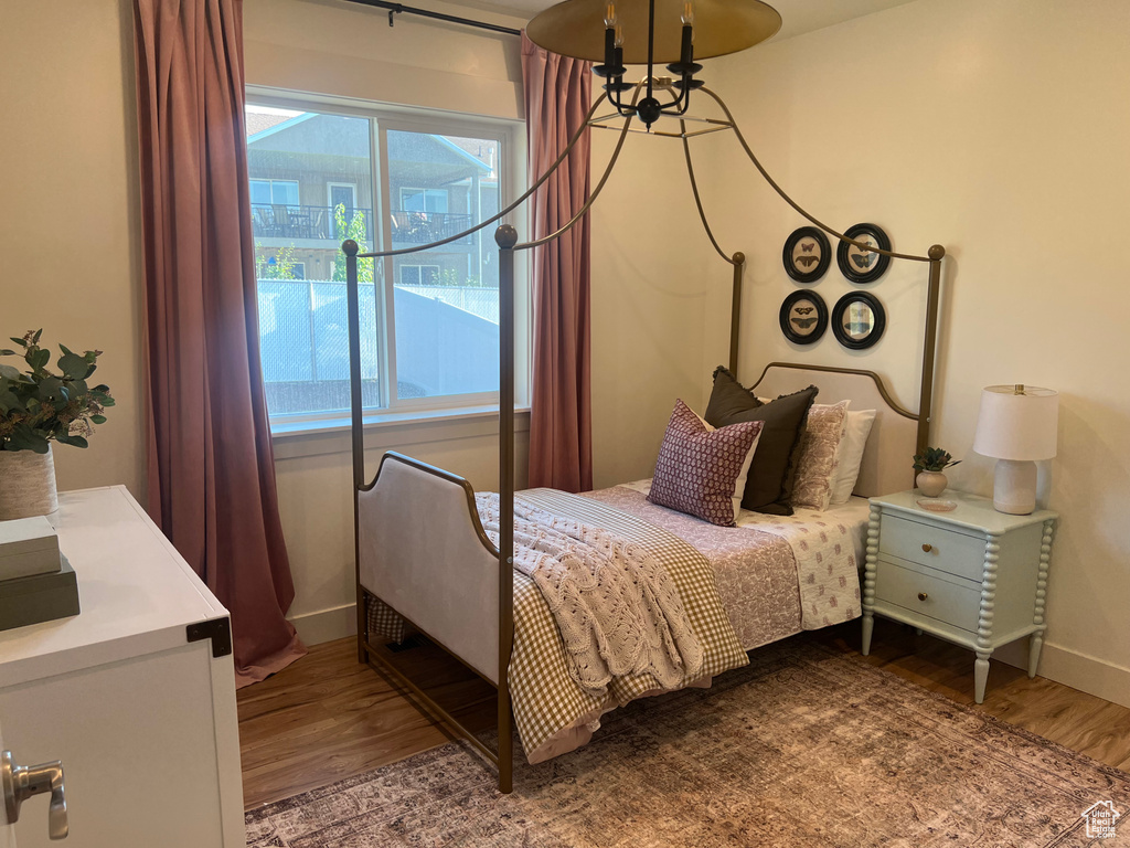 Bedroom featuring hardwood / wood-style floors