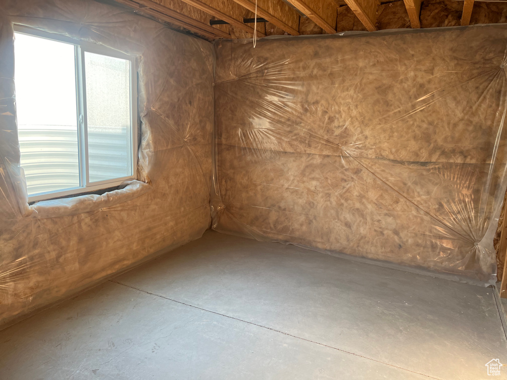 Basement featuring plenty of natural light