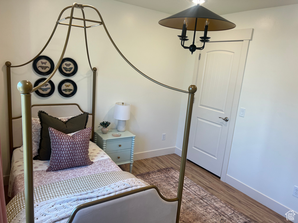 Bedroom featuring hardwood / wood-style flooring