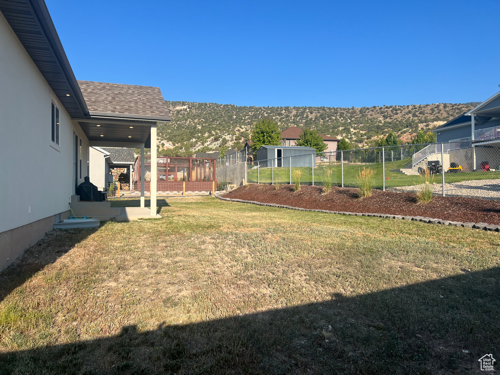 View of yard with a mountain view