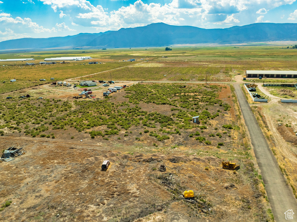 Birds eye view of property featuring a rural view and a mountain view