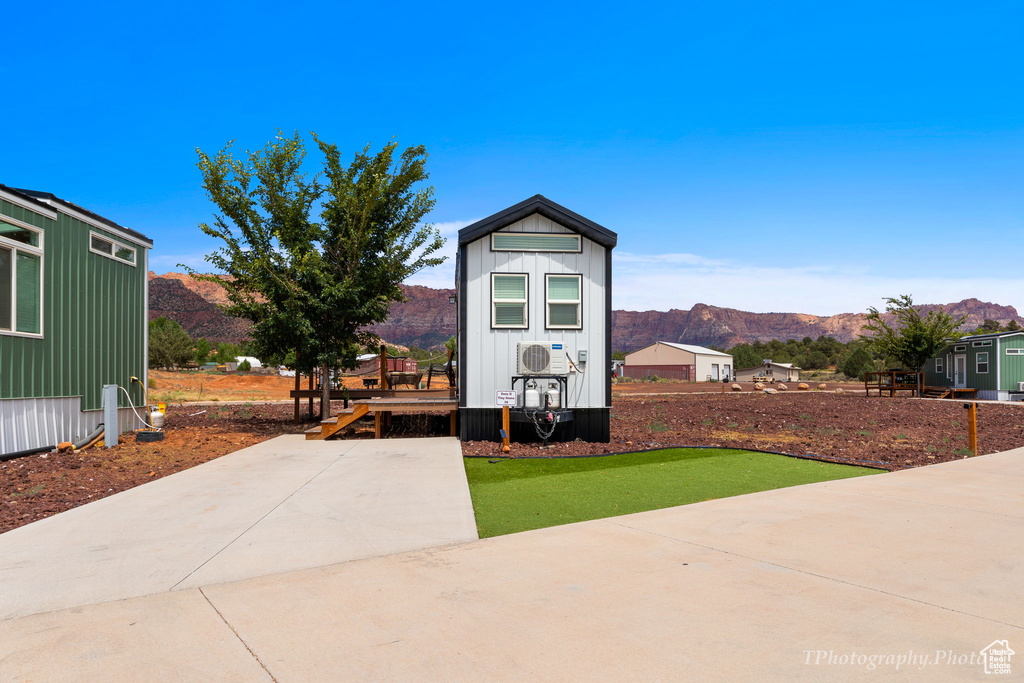 Exterior space featuring a mountain view