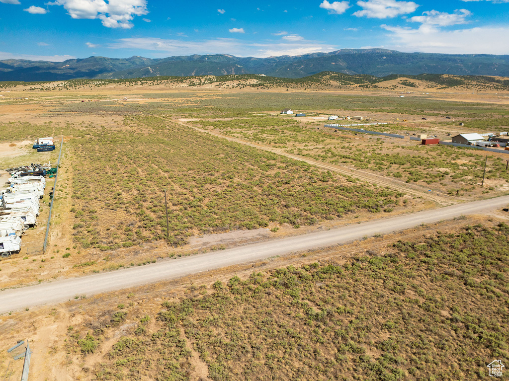Drone / aerial view with a mountain view and a rural view