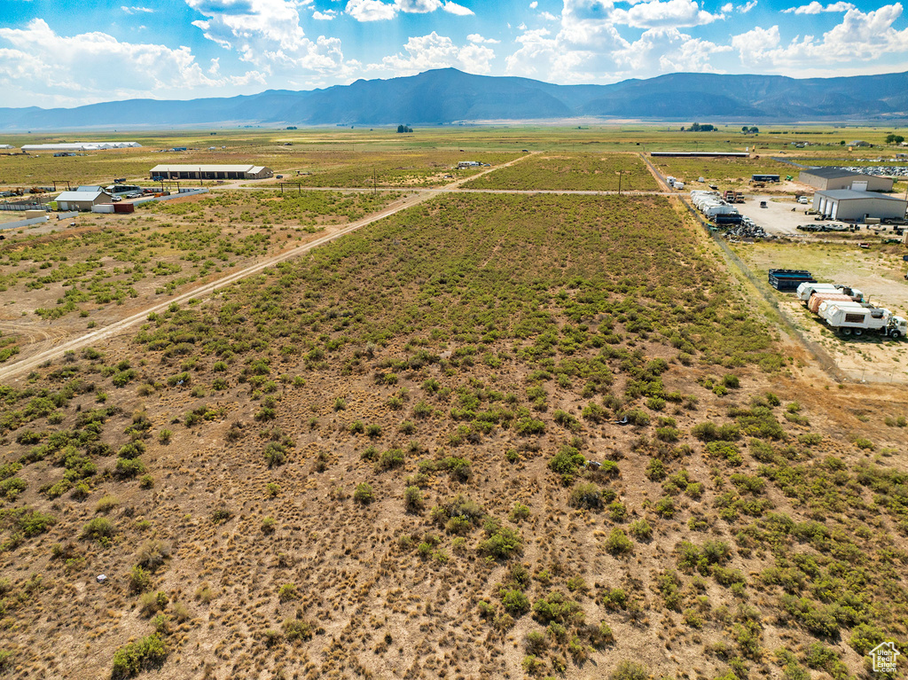 Drone / aerial view with a mountain view and a rural view