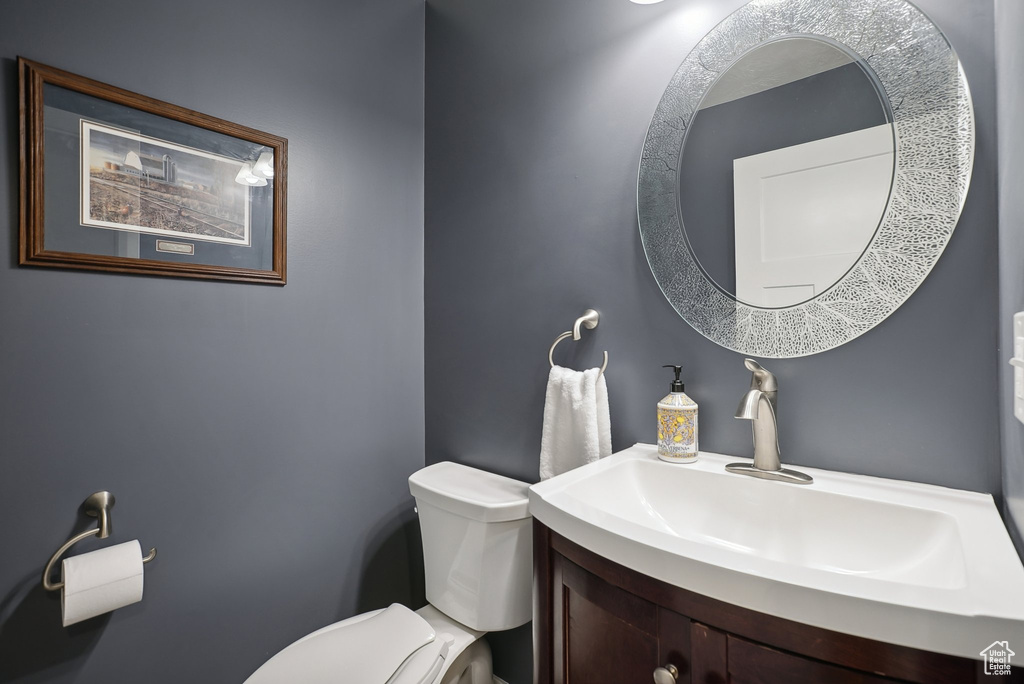 Bathroom with vanity and toilet