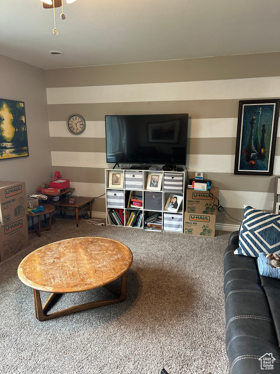 Living room featuring carpet floors