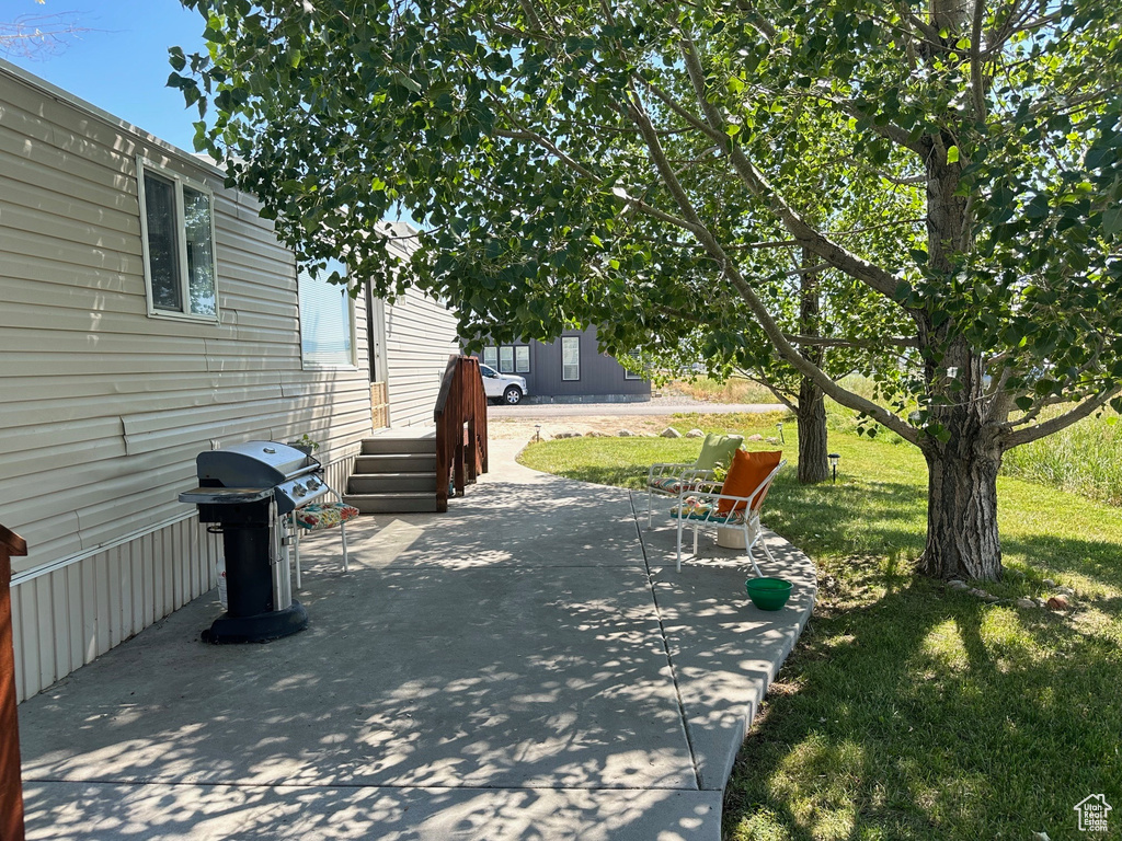 View of patio / terrace featuring a grill