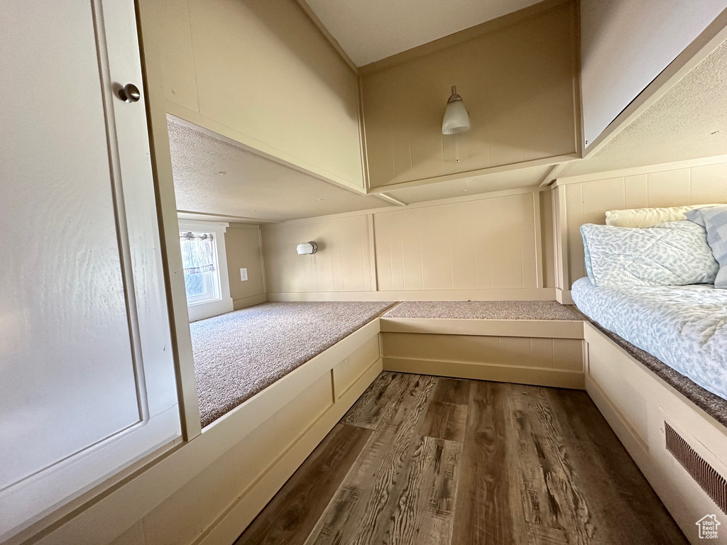 Interior space featuring dark hardwood / wood-style flooring