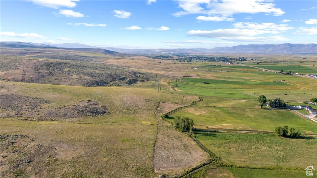Drone / aerial view featuring a mountain view and a rural view