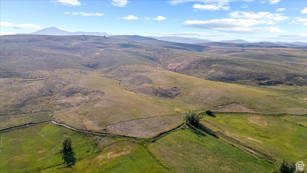 Birds eye view of property featuring a mountain view and a rural view