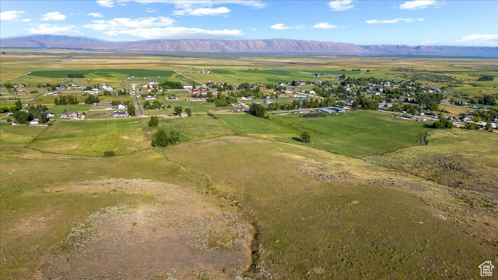 Drone / aerial view with a mountain view and a rural view