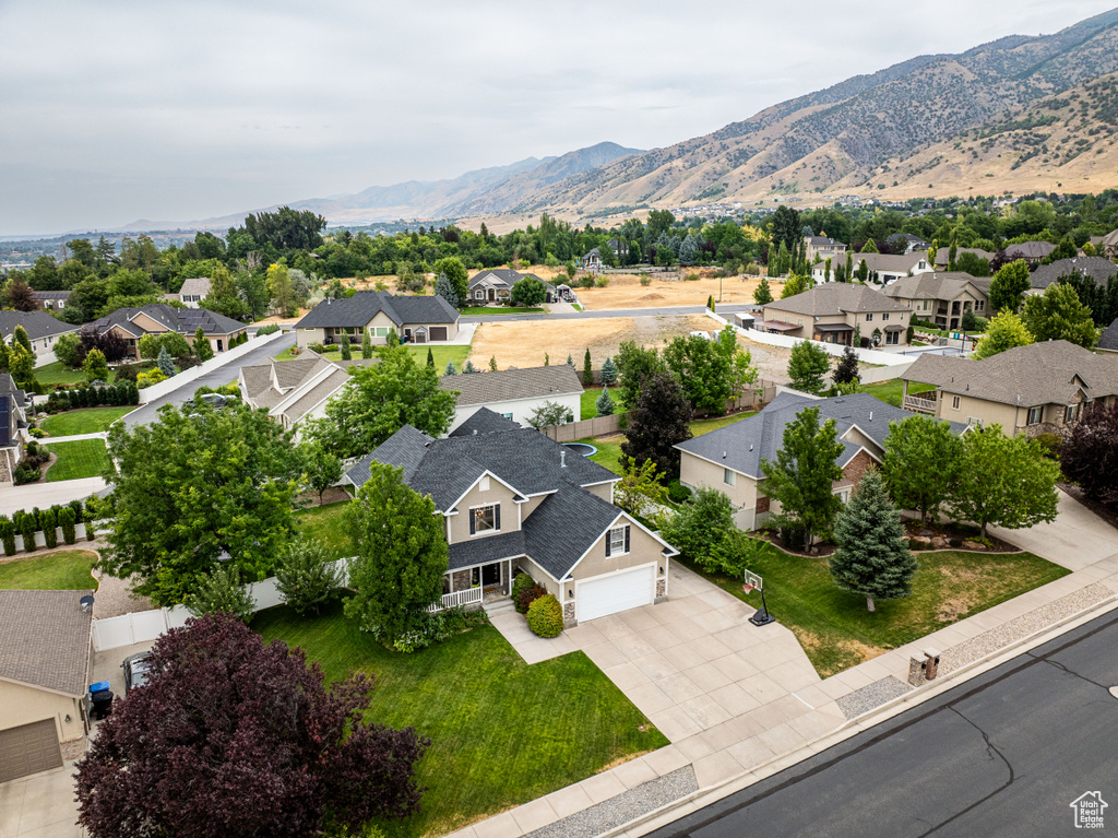 Birds eye view of property featuring a mountain view