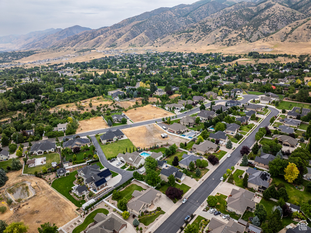 Birds eye view of property with a mountain view