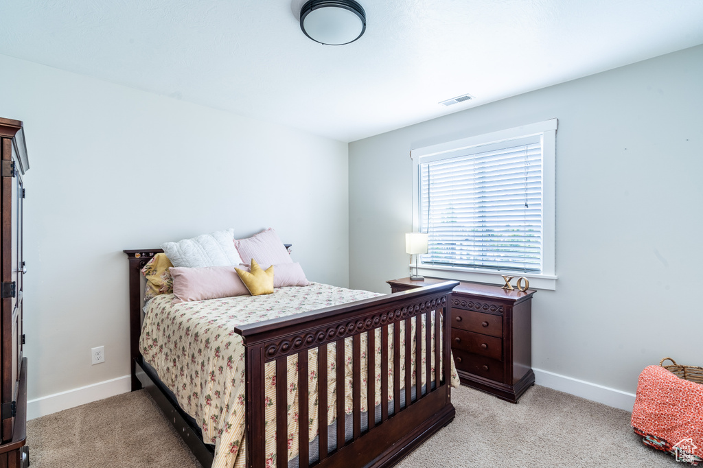 View of carpeted bedroom