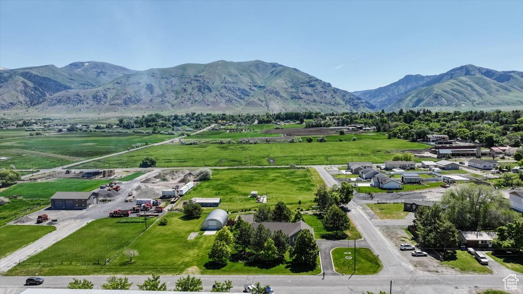 Birds eye view of property with a mountain view