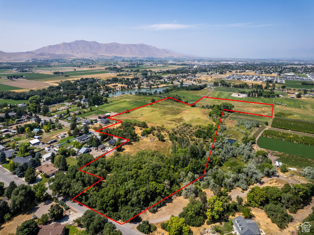 Aerial view with a water and mountain view