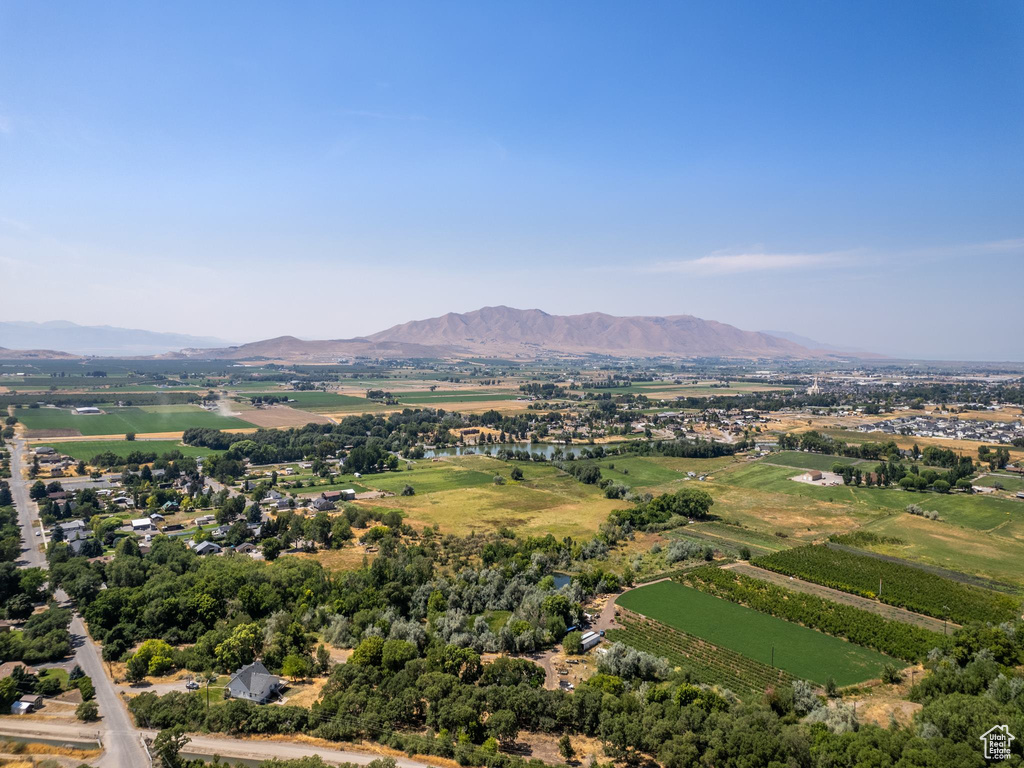 Birds eye view of property with a mountain view