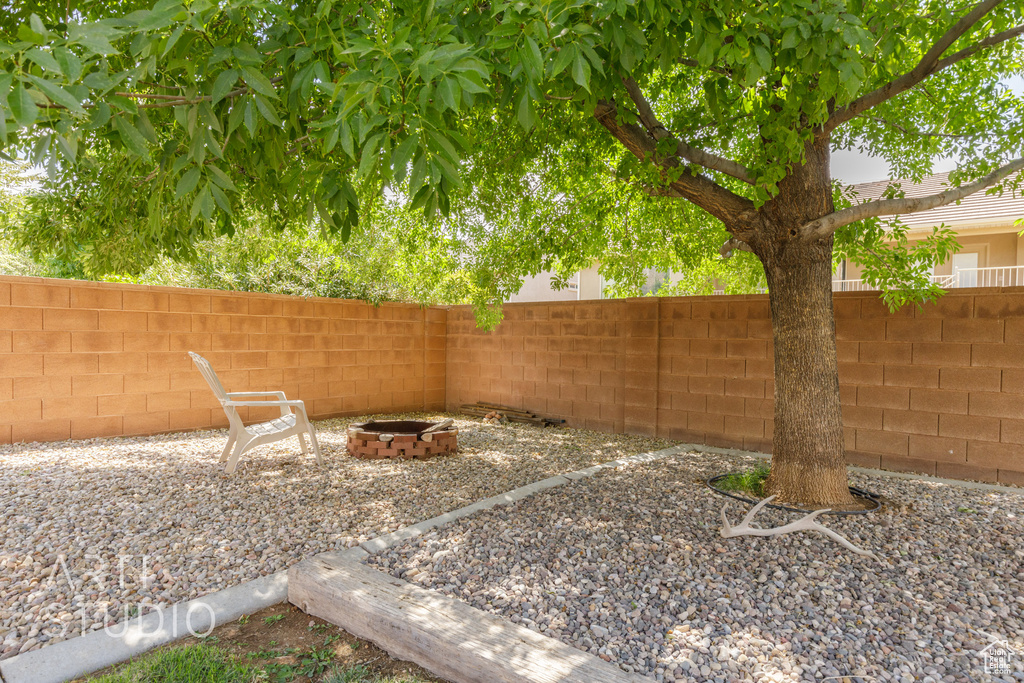 View of yard featuring a fire pit