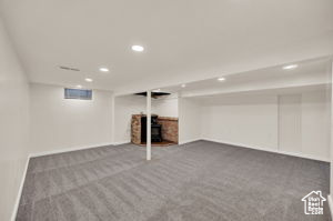 Basement with carpet flooring