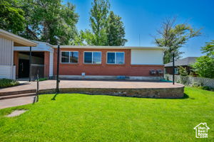 Exterior space featuring a front yard