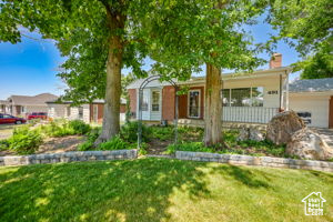 View of front of property with a front yard