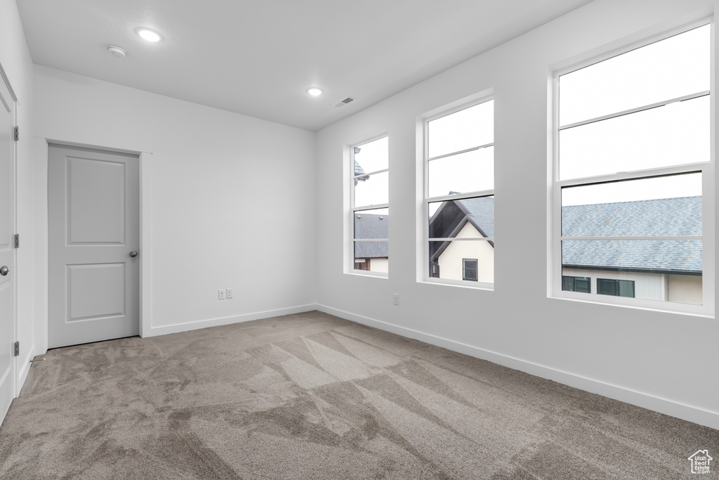 View of carpeted spare room