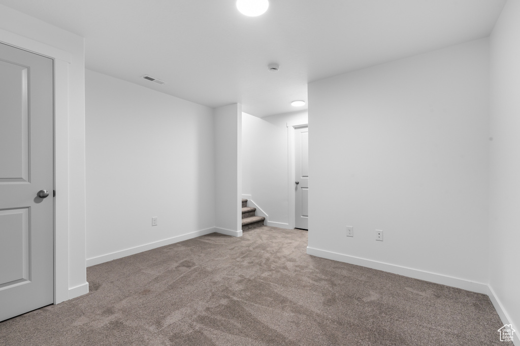 Unfurnished bedroom featuring carpet