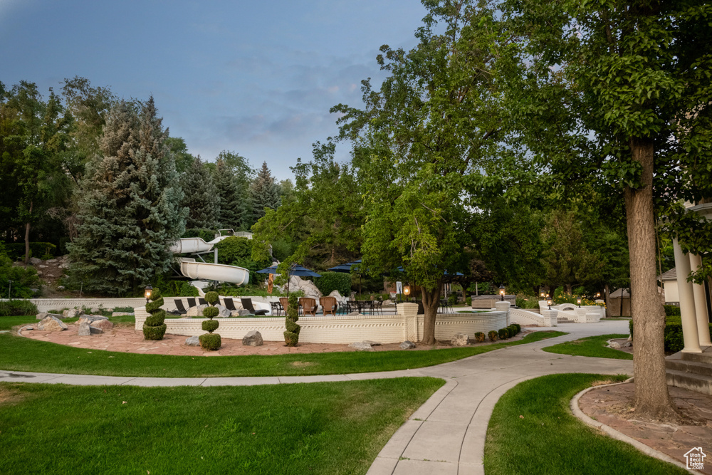 View of community featuring a lawn