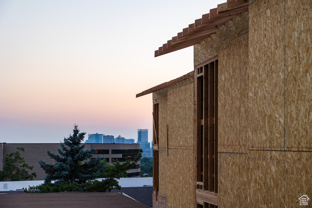 View of property exterior at dusk