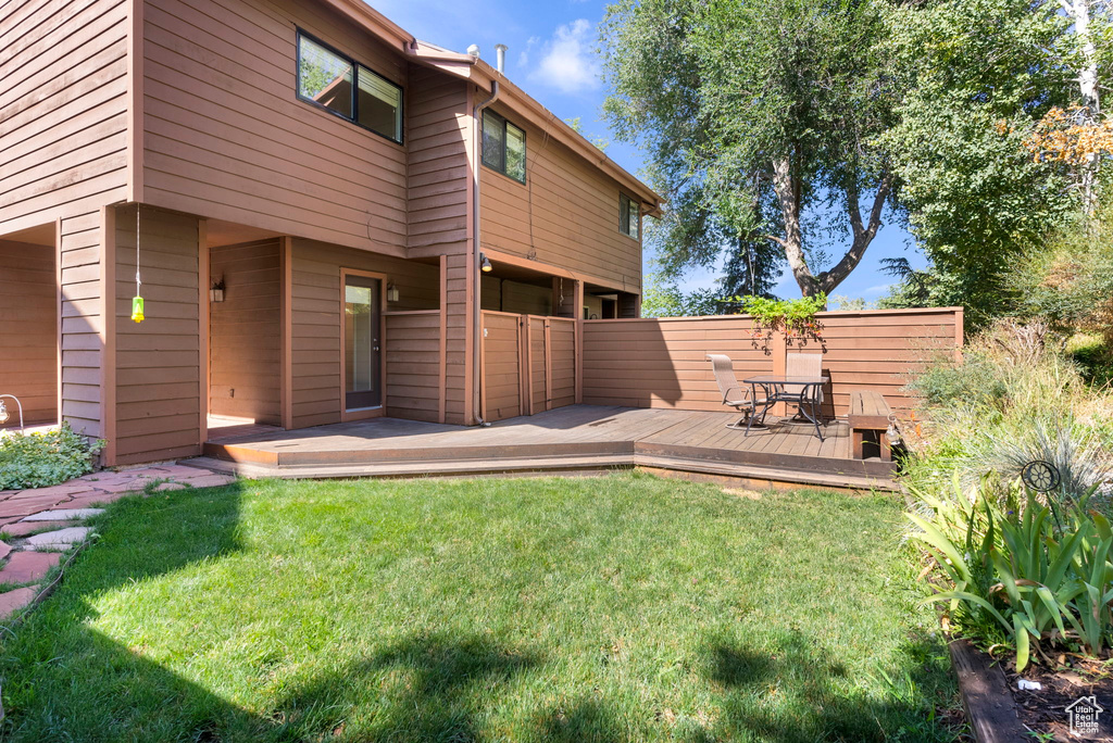 View of yard featuring a deck