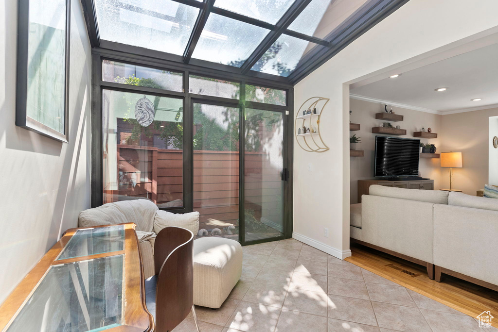 Sunroom with vaulted ceiling