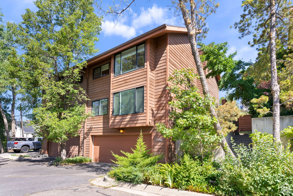 View of front of property with a garage