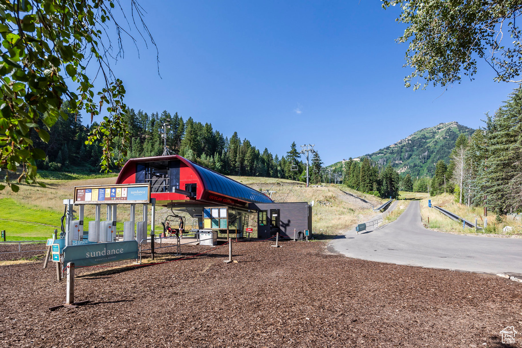 View of playground with a mountain view