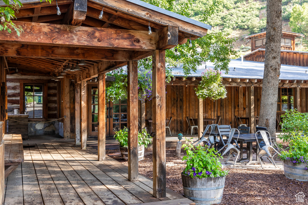 View of patio featuring a wooden deck