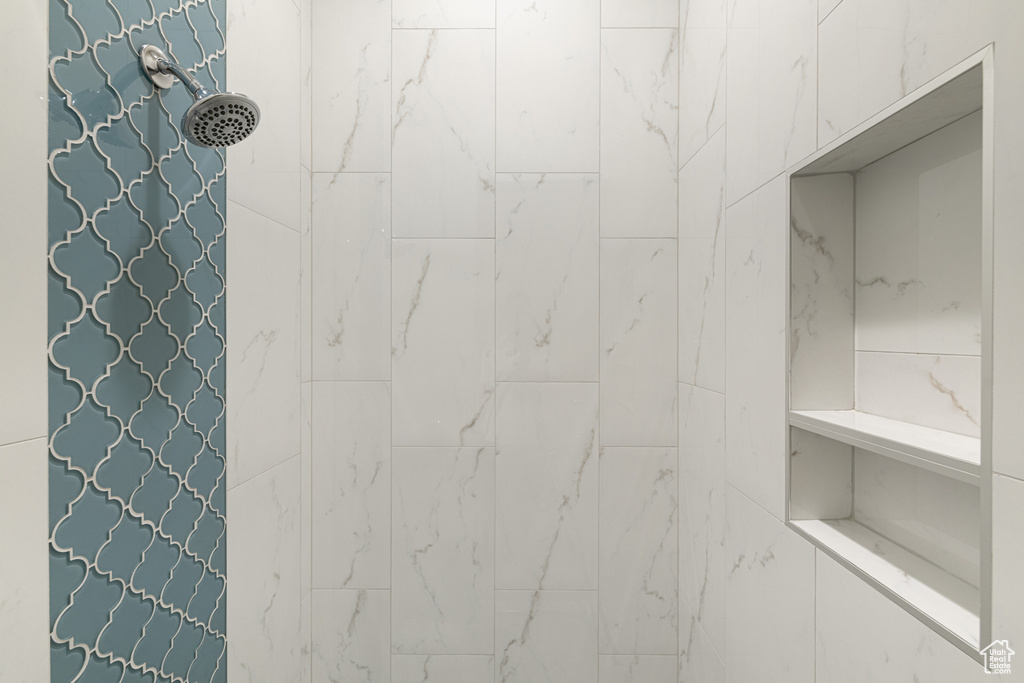 Interior space featuring tiled shower