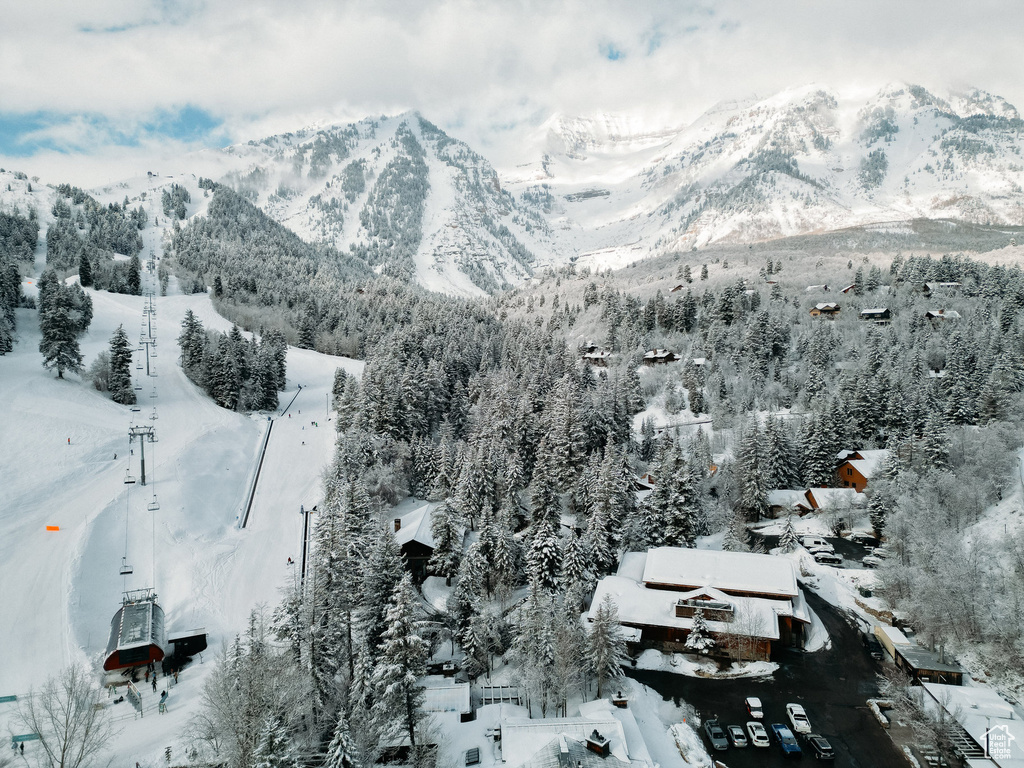 Snowy aerial view with a mountain view