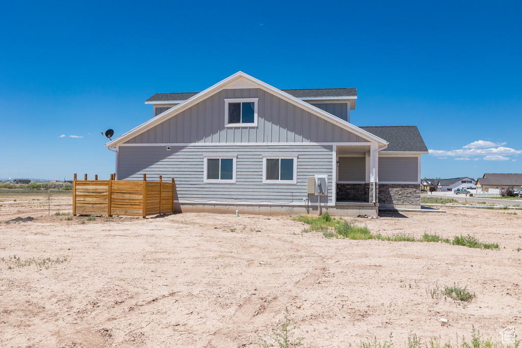 Back of property with board and batten siding