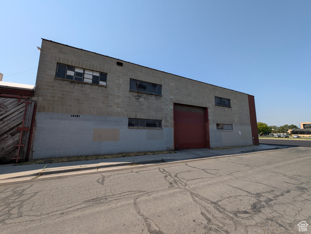 View of property featuring a garage