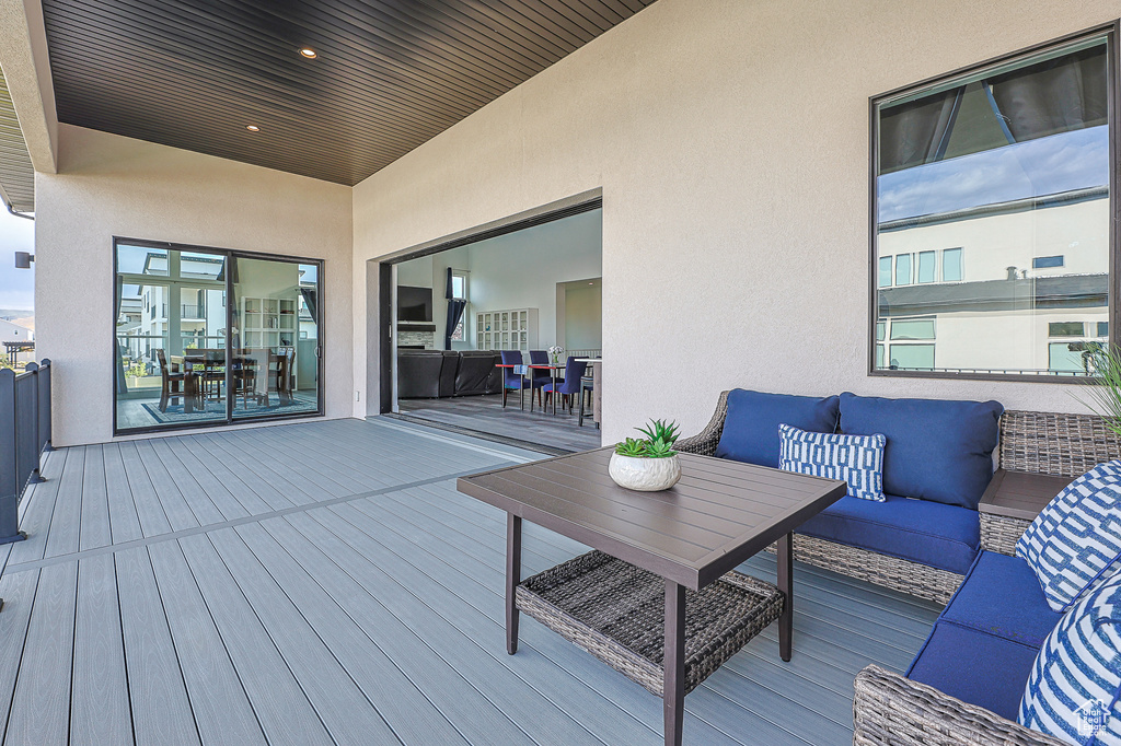 Deck featuring outdoor lounge area