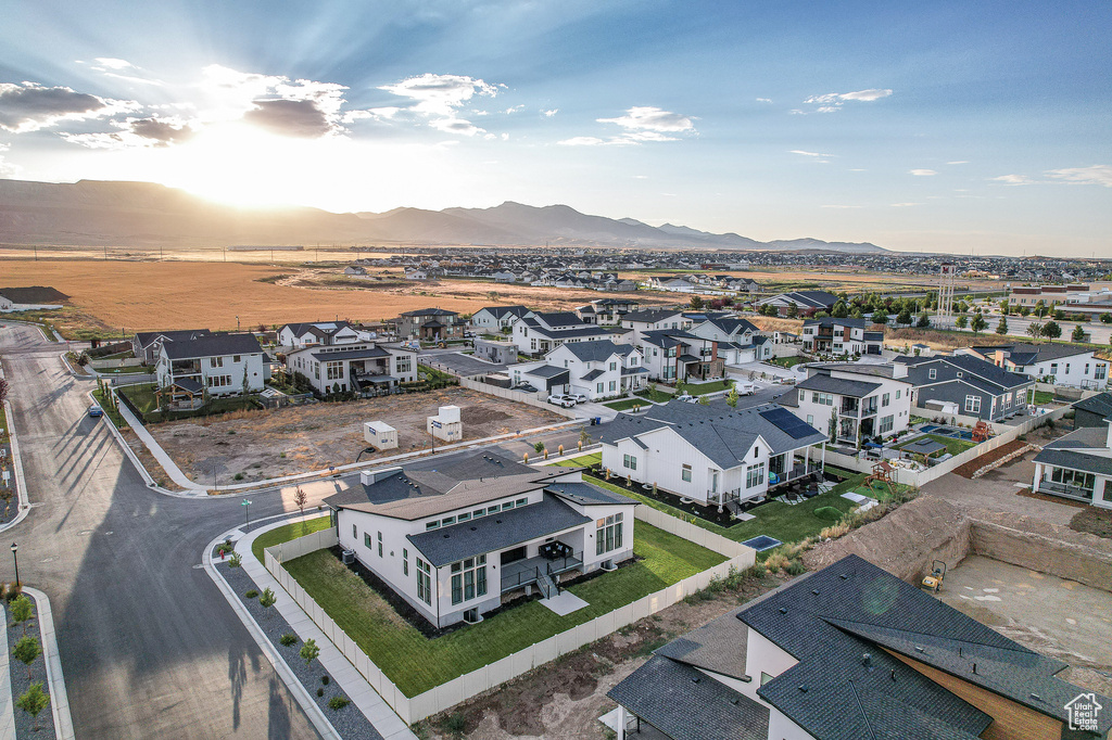 Birds eye view of property with a mountain view