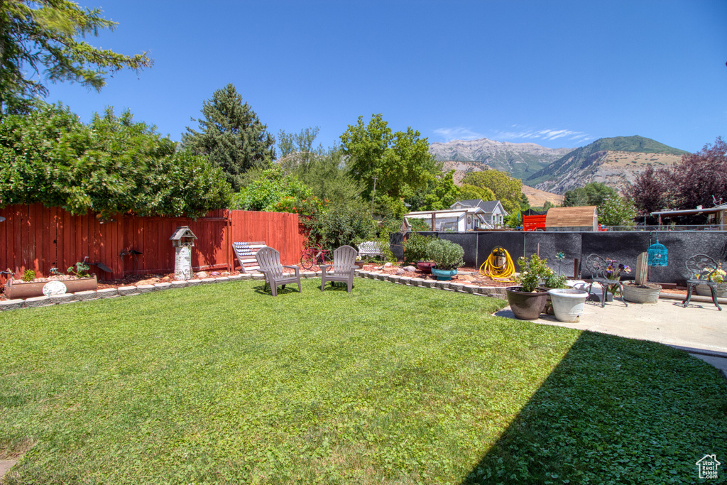 View of yard with a mountain view