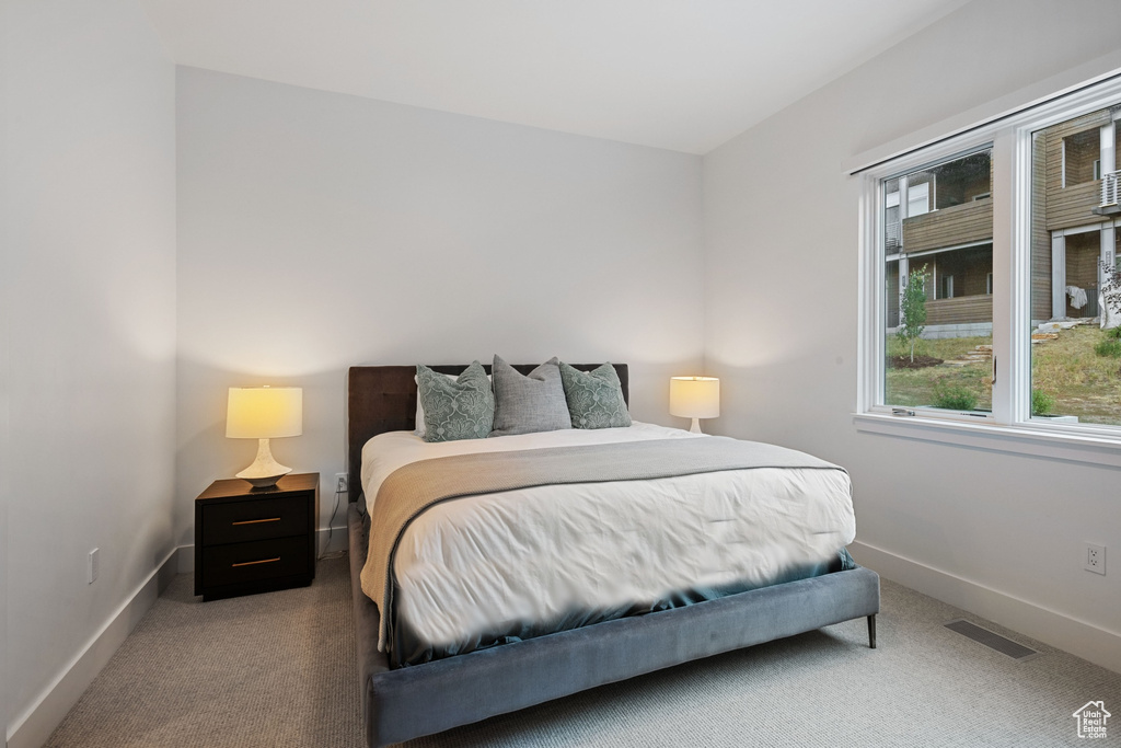 View of carpeted bedroom