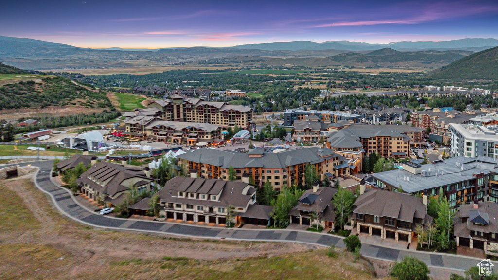 Aerial view at dusk featuring a mountain view