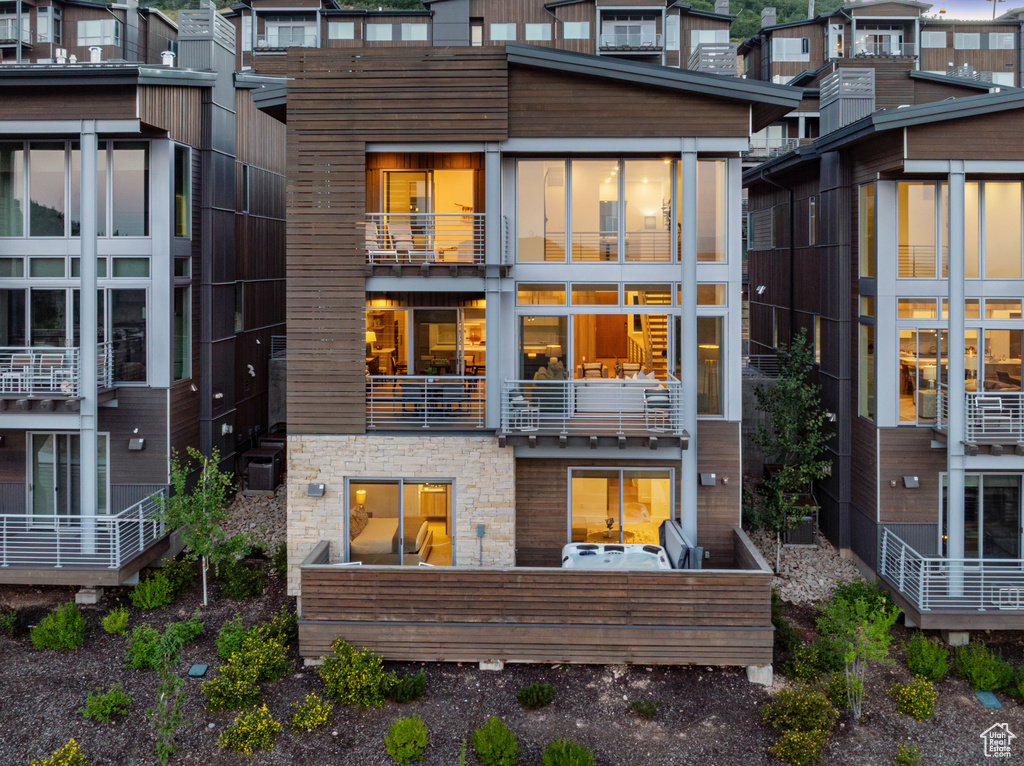 Rear view of house with a balcony